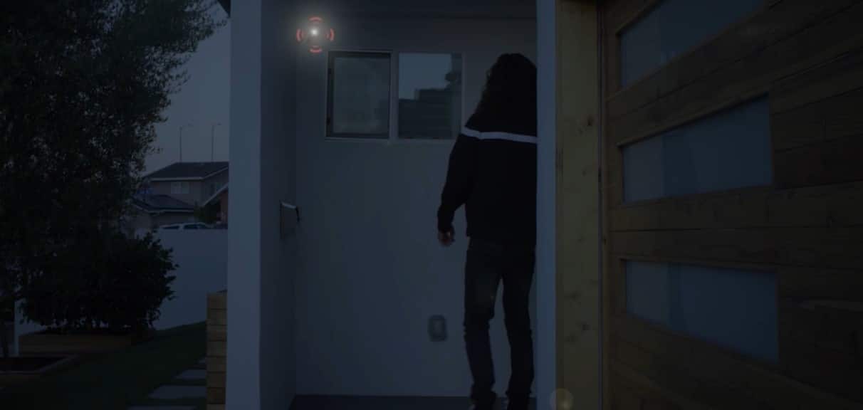 Security camera monitoring a front entry at night
