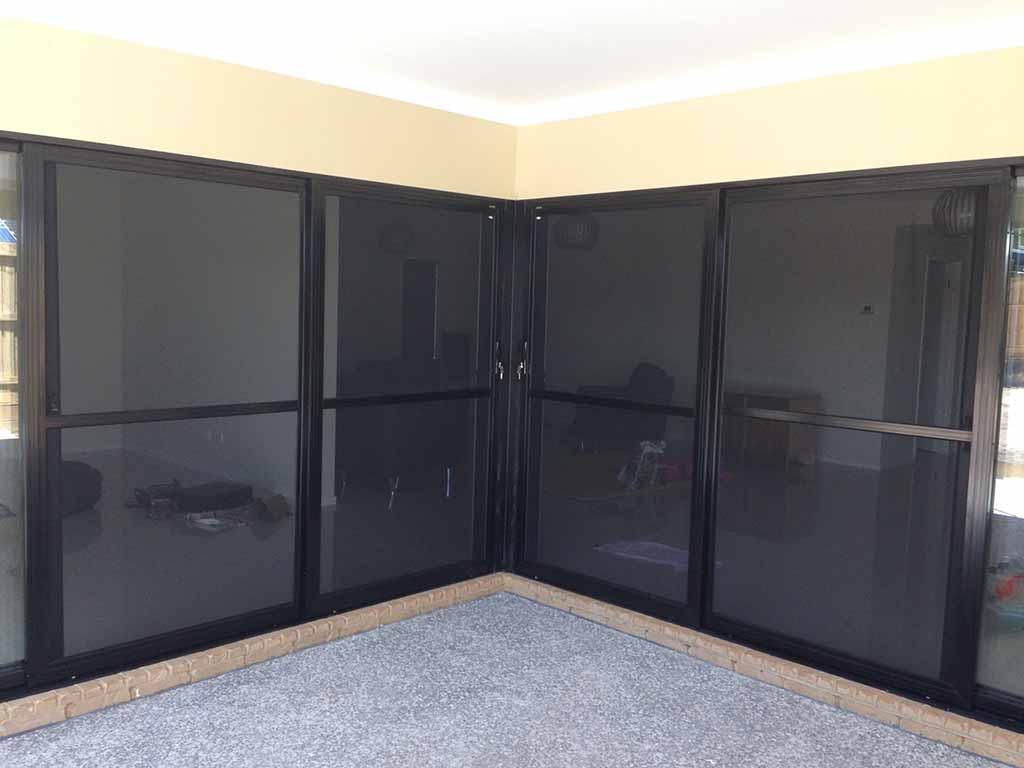 Crimsafe double stacker security doors installed on a Queensland home