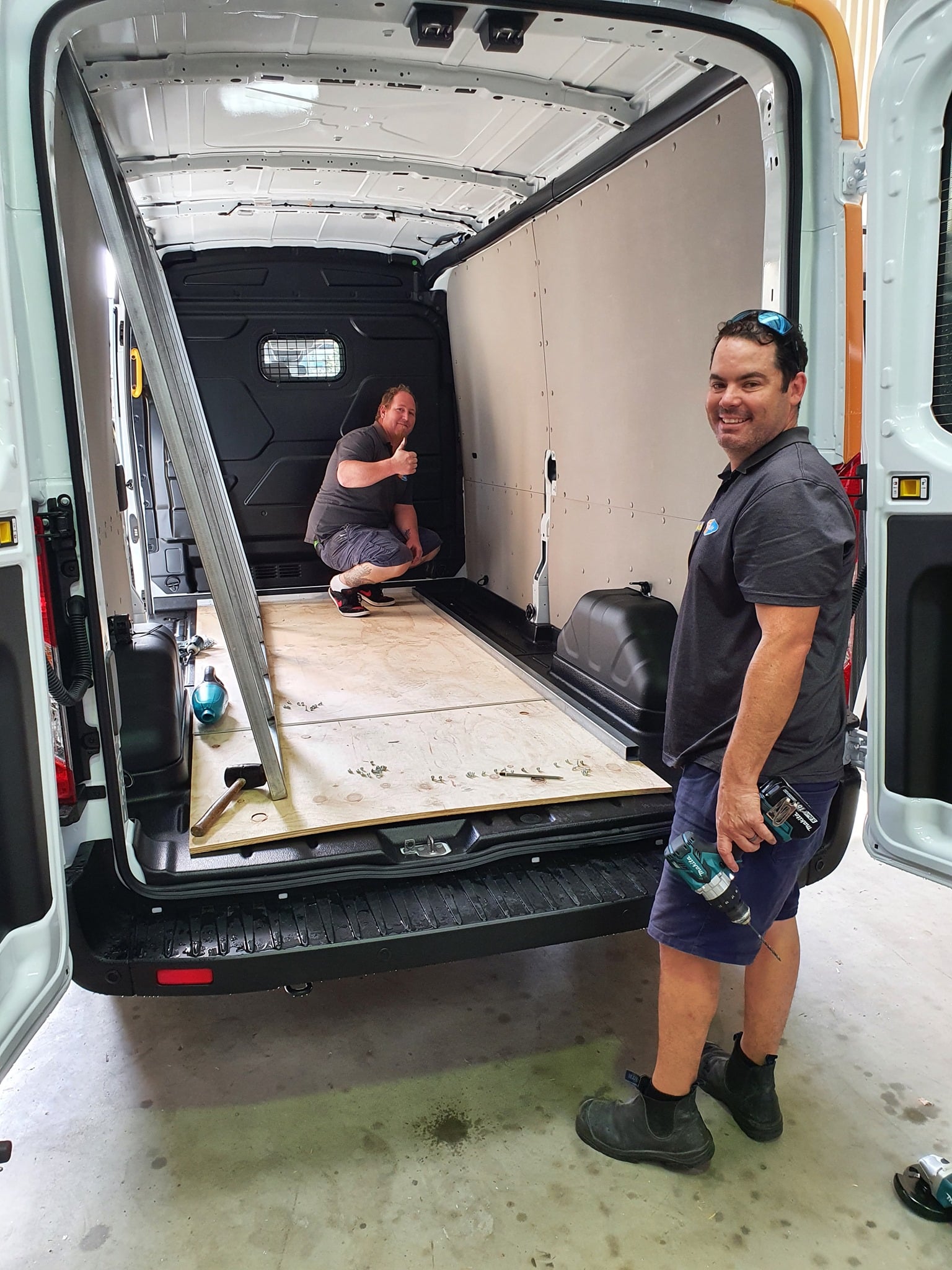 Securelux installation team loading factory-built screens for delivery and installation