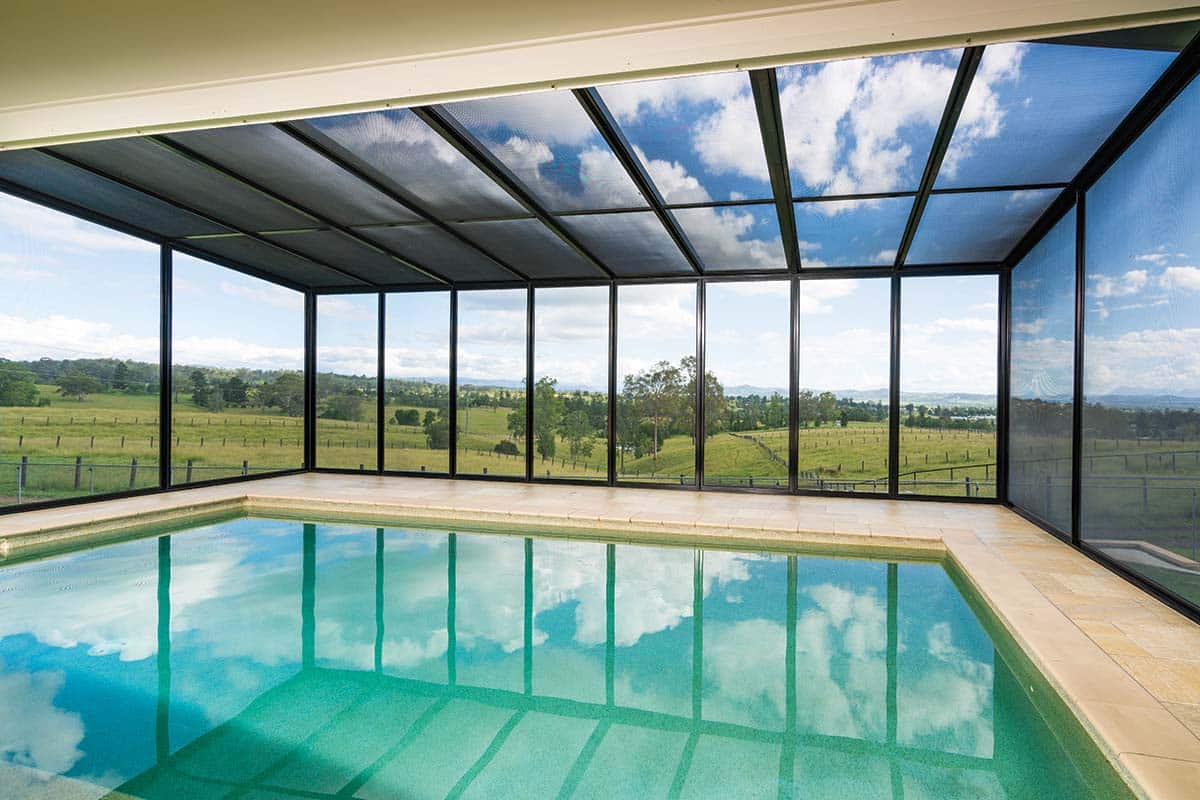 Securelux custom screen installation on a patio enclosure